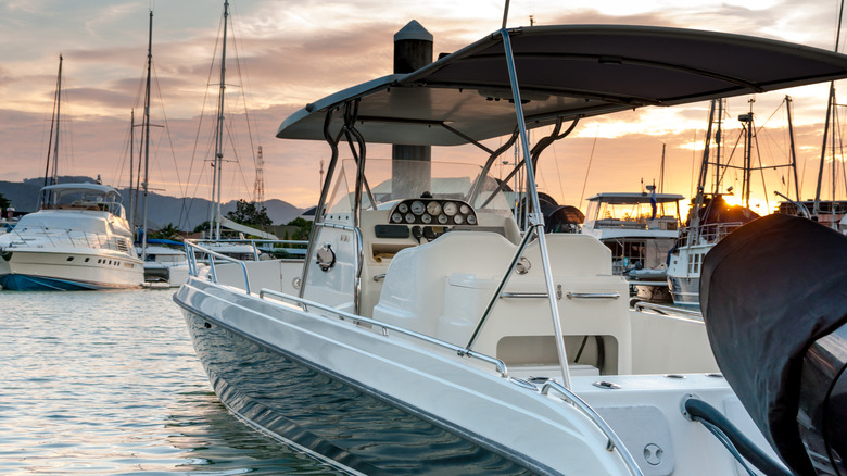 Motorboat docking at marina.