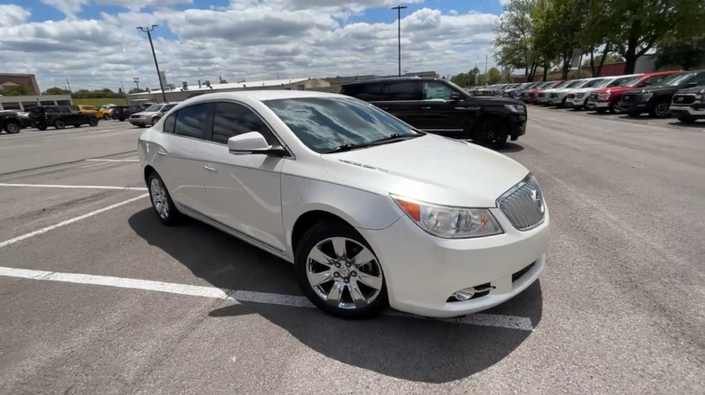 A white 2012 Buick LaCrosse in a parking lot