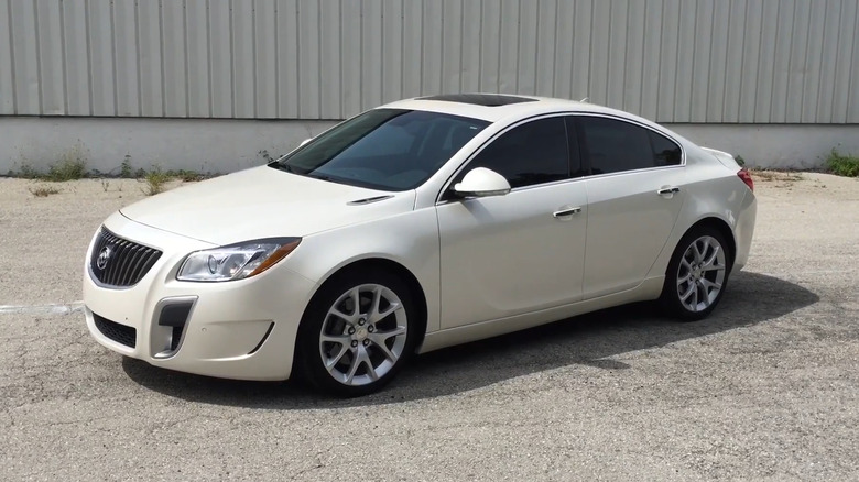 A white 2013 Buick Regal parked