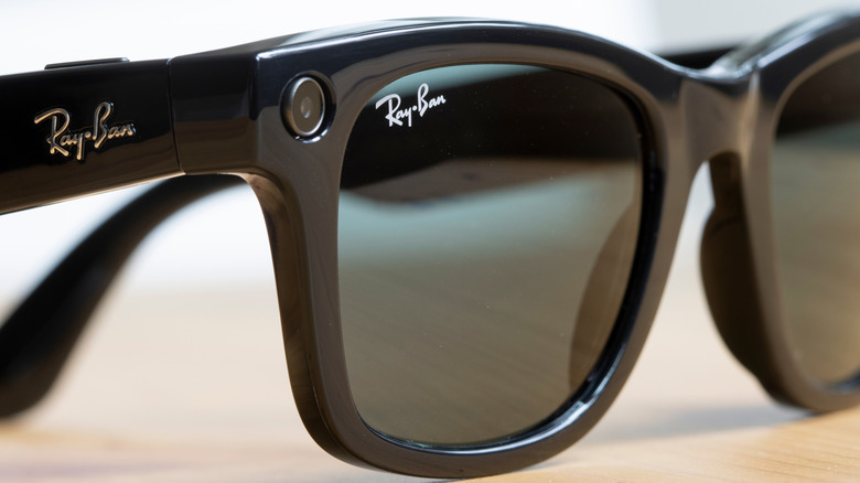 Ray-Ban branded smart glasses with black frames and sunglass lenses