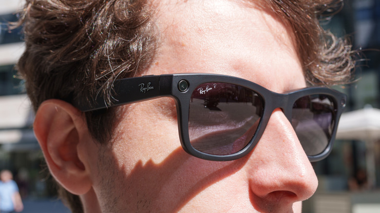 Man wearing sunglass-style Ray-Ban smart glasses