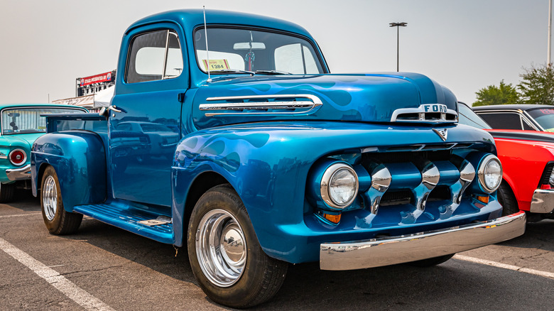 Blue Ford F-1 in parking lot