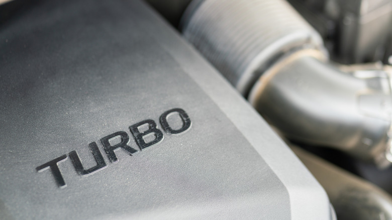 Close-up of an engine labeled turbo