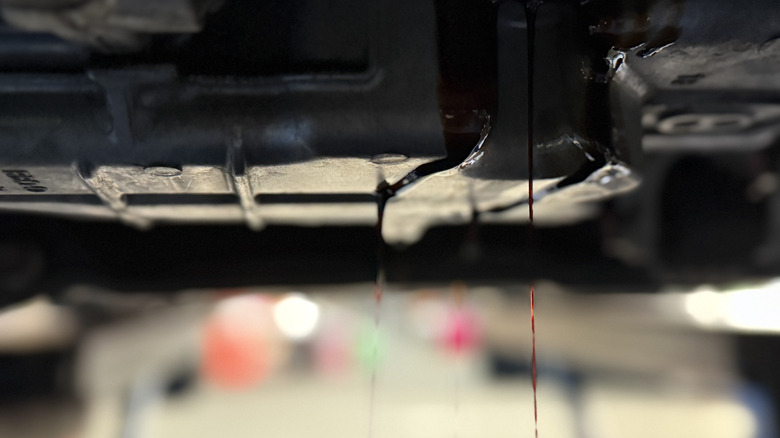 A slose up of a leak coming from under the carriage of an engine