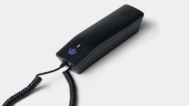 A black Wiley Wi-Fi-enabled home phone sitting on a white surface