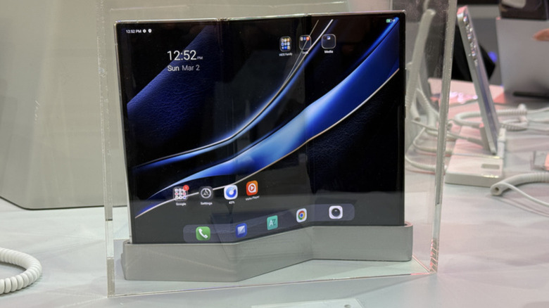 Tecno Foldable phone under glass.
