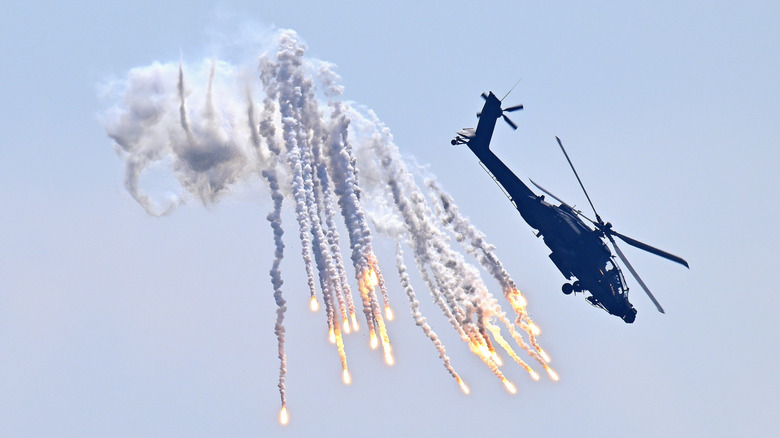 Apache helicopter firing off flares