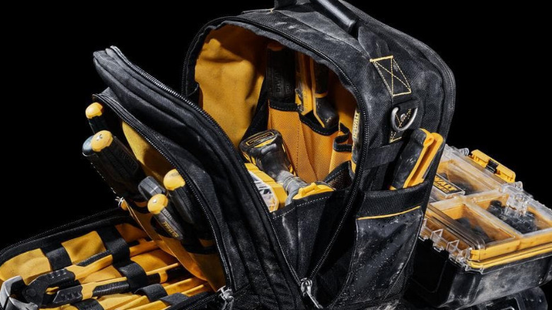 The DeWalt Compact Tool Bag next to a small parts container.
