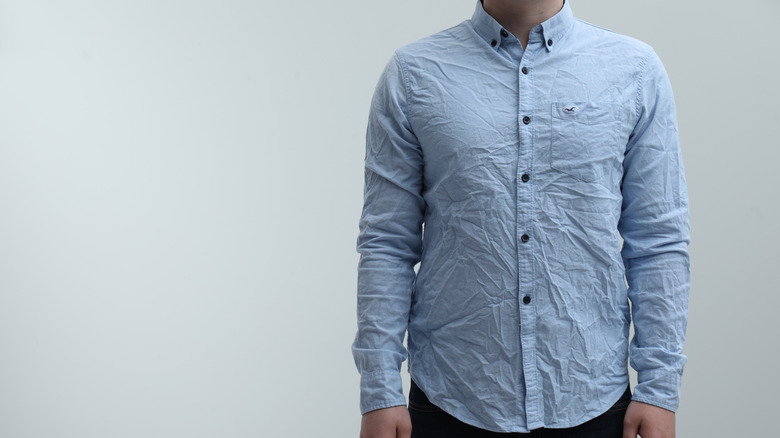 man wearing creased clothes