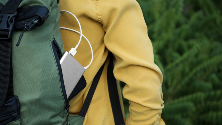 powerbank sticking out of backpack