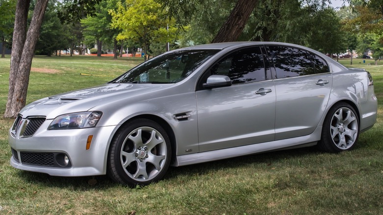 Silver Pontiac G8 GT parked grass