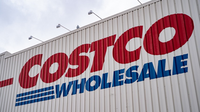 Costco signage on a warehouse store front.