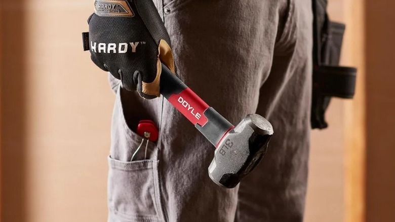 Person holding Doyle 3 lb. Steel Drilling Hammer