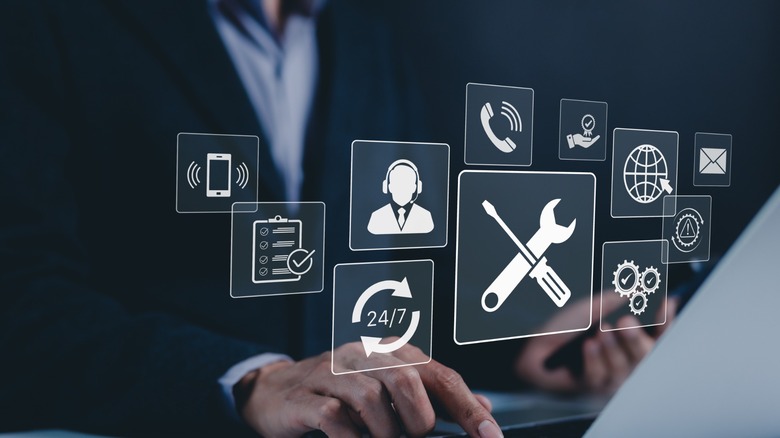 Several translucent icons floating above a laptop user, indicating multiple sources to select the appropriate tools.