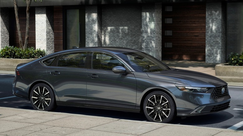 A silver Honda Accord parked on the street