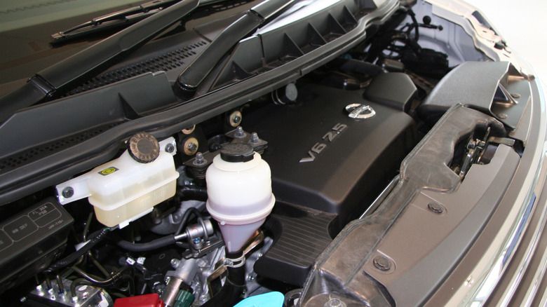 Engine compartment with a 2007 Nissan VQ25DE engine installed