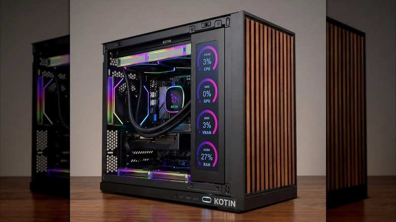 A KOTIN pre-built PC with temperature displays on a wooden surface