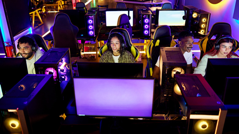 A group of people using gaming computers