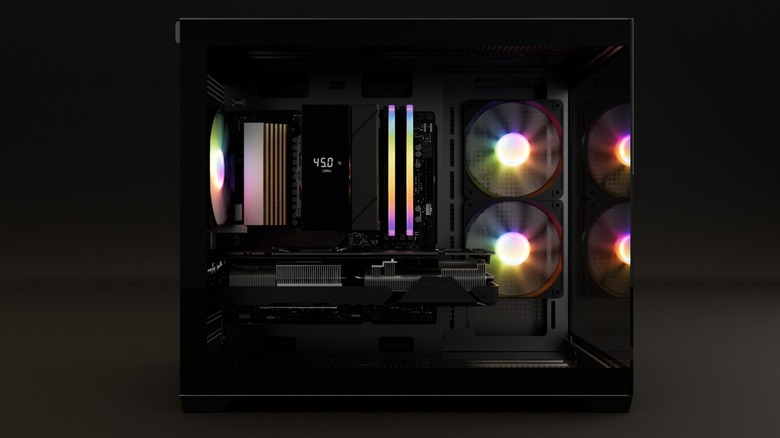 A side view of a Spectra Gaming PC on a flat, dark surface