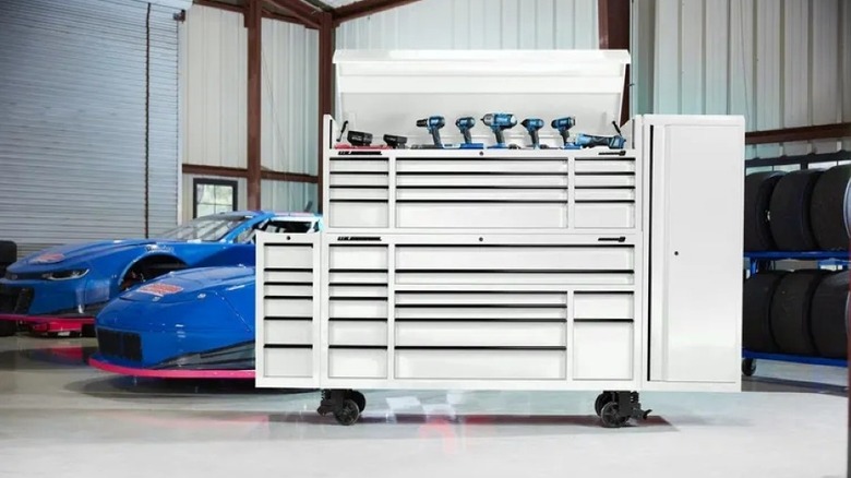 A U.S. General white toolbox in an auto garage.