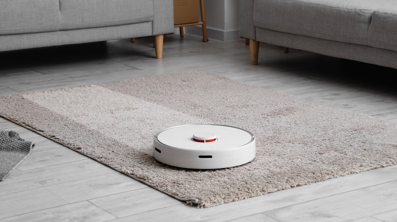 Robot vacuum on a rug