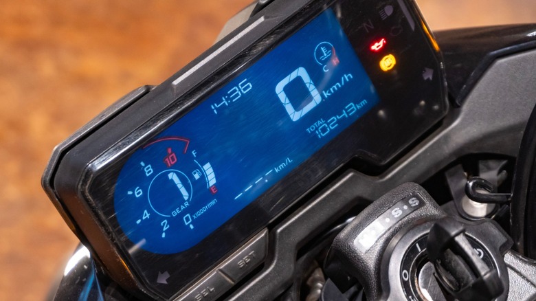 A digital gauge cluster on a motorcycle.