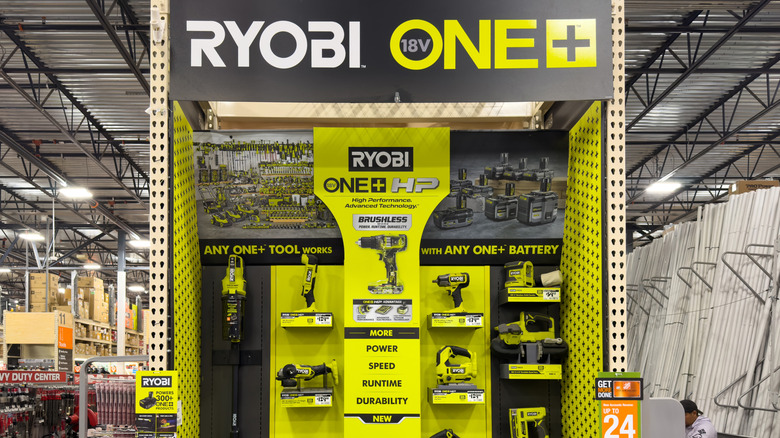 A display of Ryobi tools inside a Home Depot store