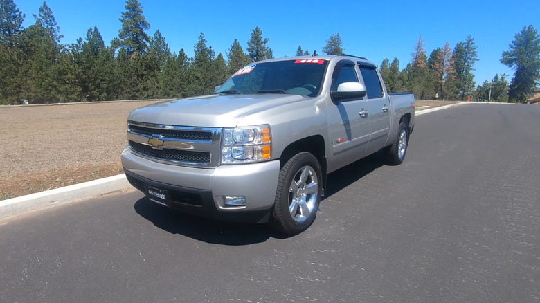 A 2008 Chevrolet Silverado parked on the side of the road.