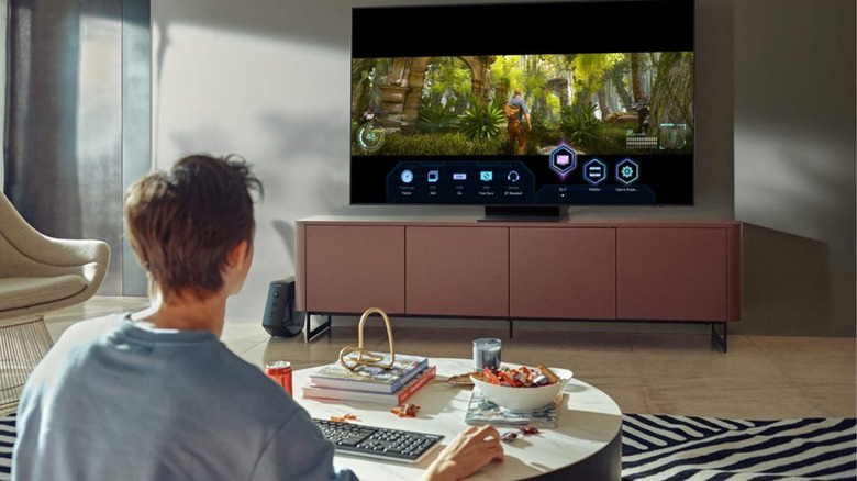 woman gaming on Samsung TV