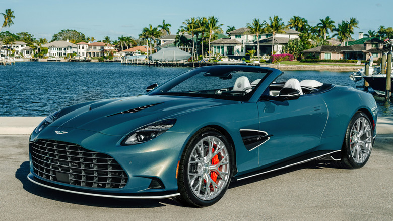 Front 3/4 view of Aston Martin Vanquish Volante in Florida bay setting
