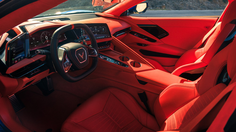 The interior of a Corvette in red