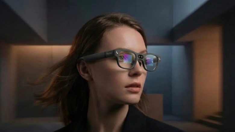 Woman wearing RayNeo's X3 Pro AR smart glasses