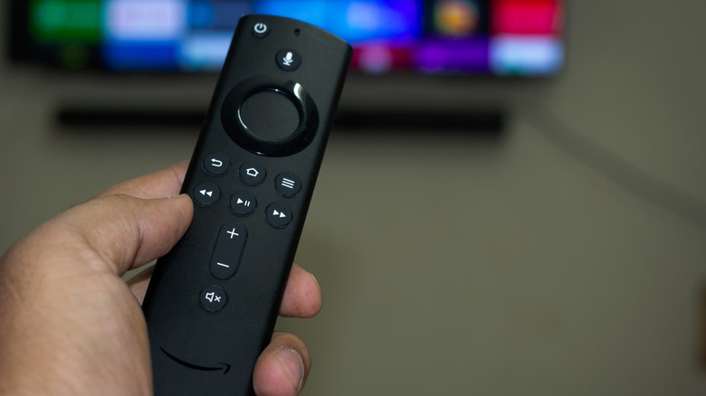Fire TV Stick remote in man's hand