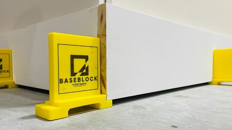 BaseBlock tools wedged under pieces of wood.