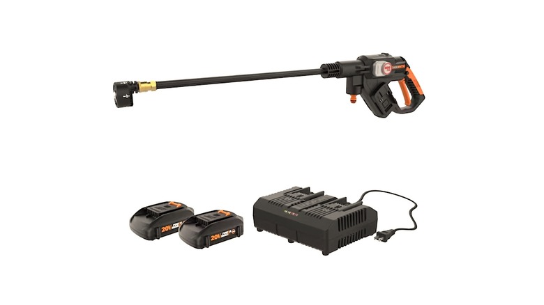 A WORX pressure washer, two battery packs, and a battery charger against a white background