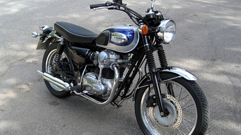 A retro Kawasaki motorcycle on a sunny day