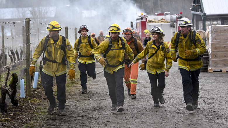 Firefighters running