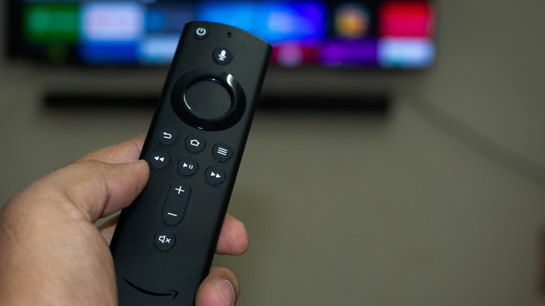 Amazon Fire TV remote with blurred channels