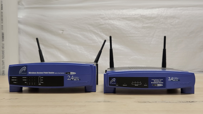 Two Linksys WRT54G classic Wi-Fi routers side by side