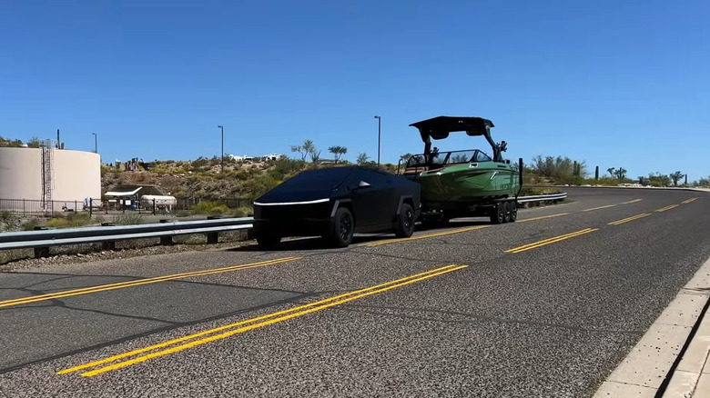 cybertruck towing an 8,000 pound boat