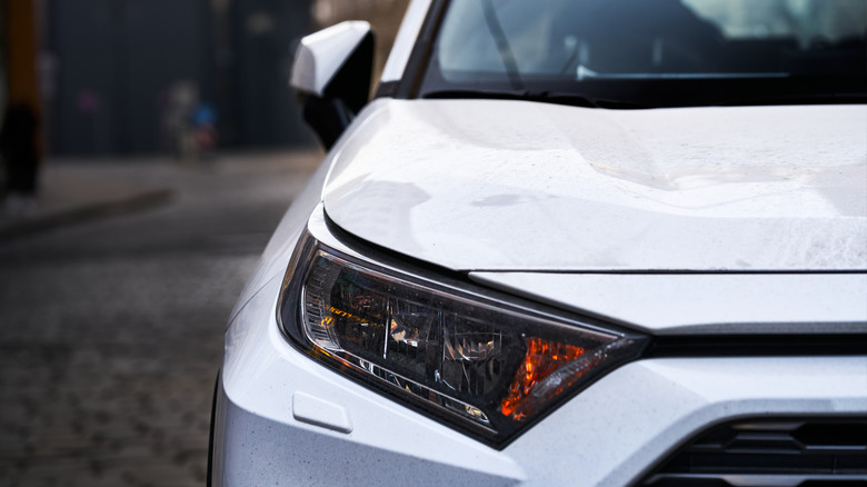 car front headlight closeup