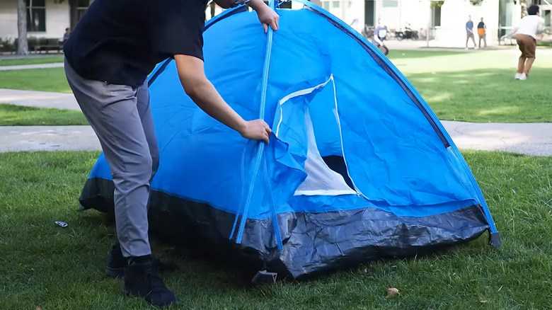 MIT researcher assembling a tent with 3D zippers