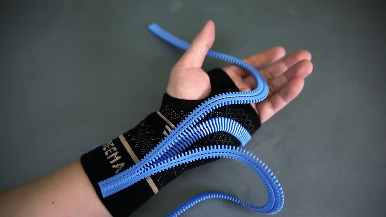 A wrist cast with a 3D zipper