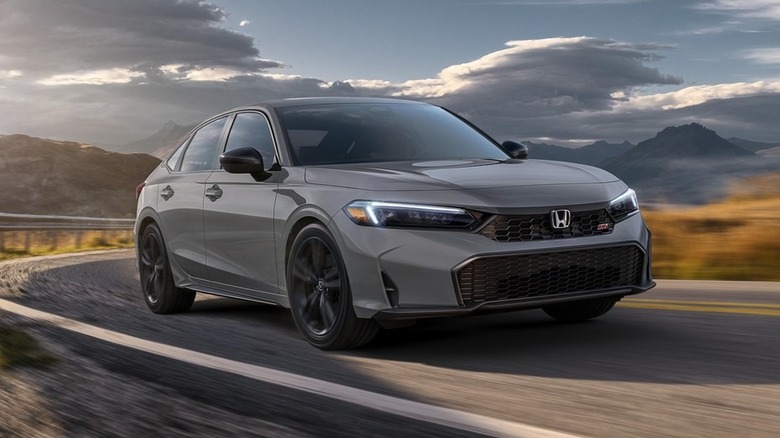 2025 Honda Civic in gray, front 3/4 view