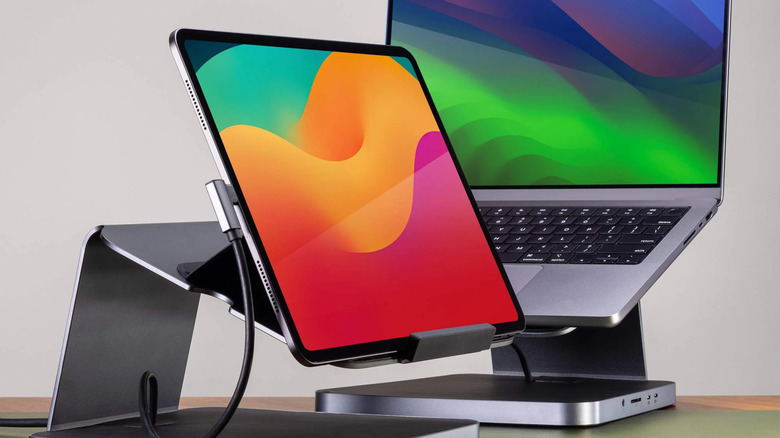 A pair of Zagg Pro Docks holding an iPad and a MacBook