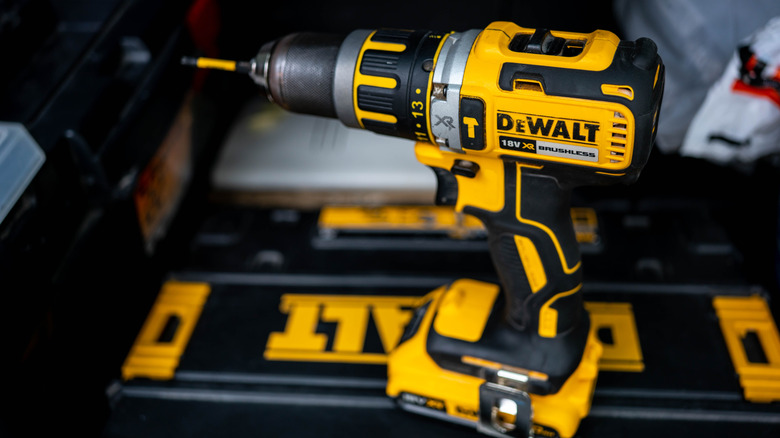 DeWalt cordless drill sitting on a DeWalt toolbox