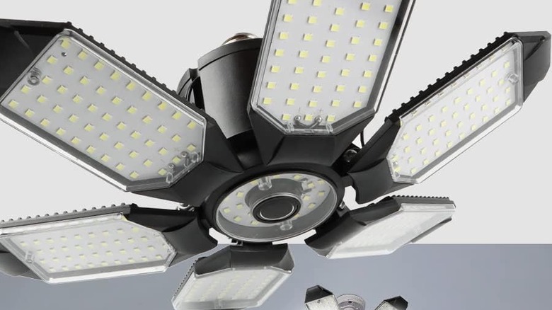 The POLARPRA LED ceiling light up close, gray background