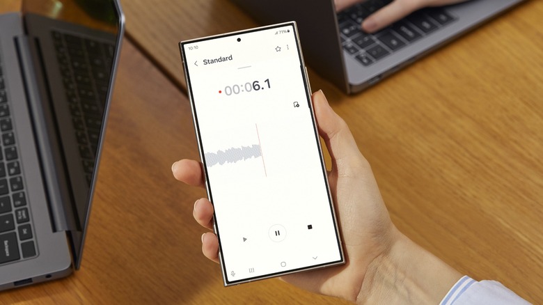 A Samsung Galaxy S24 smartphone in a person's hand