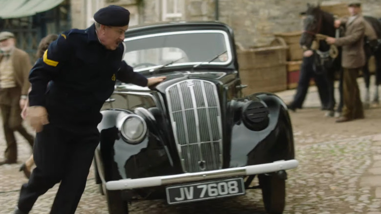 black morris eight series e in car chase