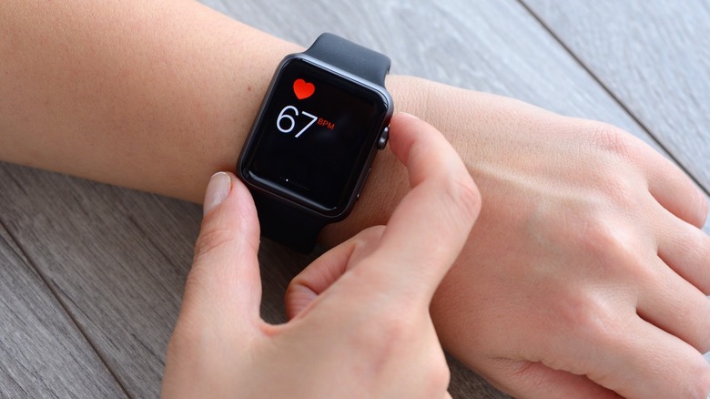 Apple Watch displaying heart rate